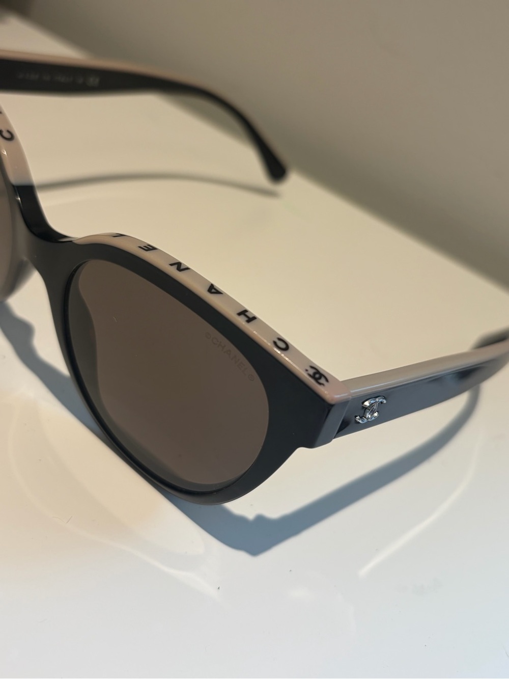 CHANEL Black and Beige Two-Tone Round Sunglasses